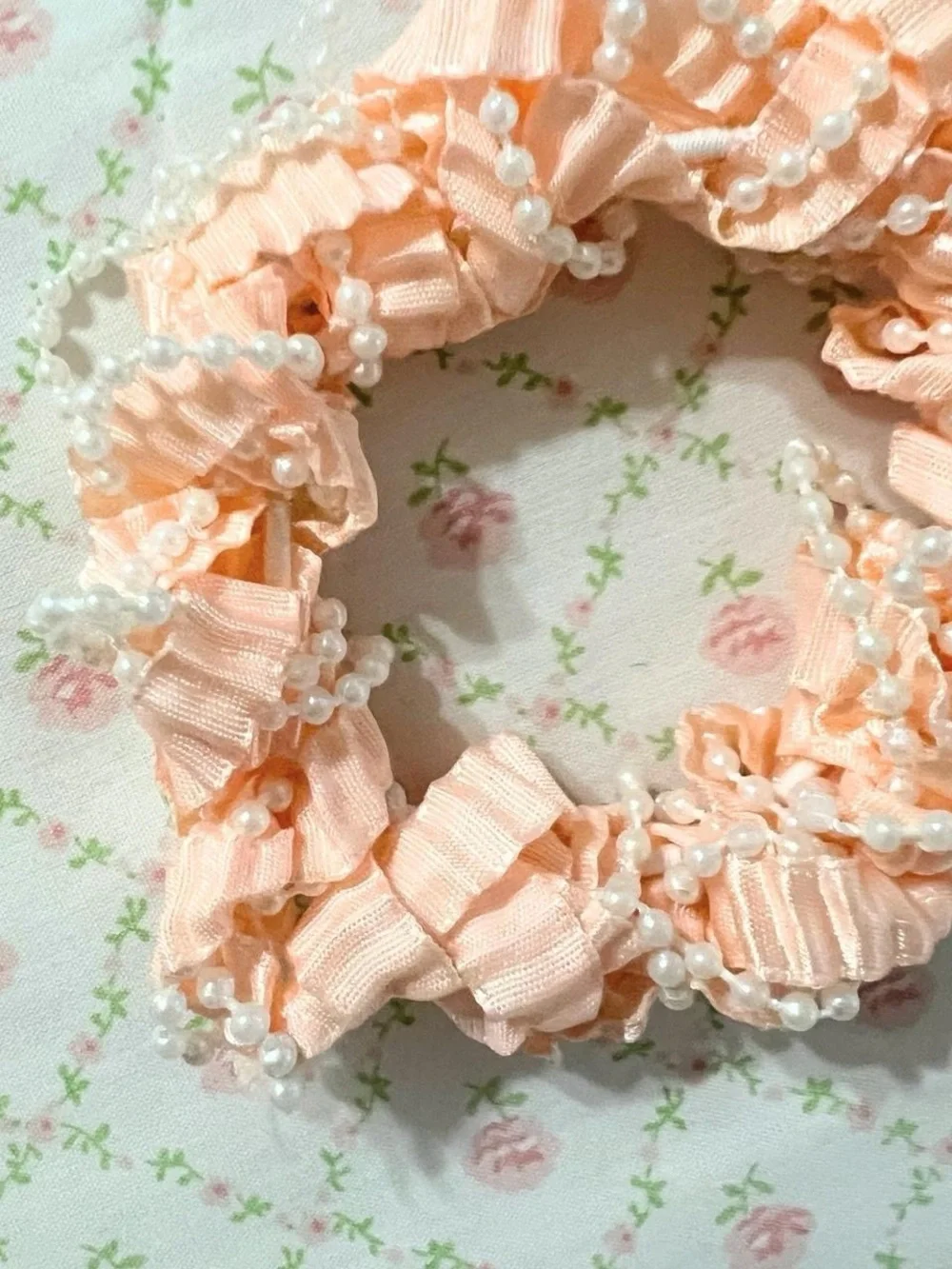 Peach colored scrunchies set.